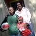Anne Awori poses with her sons Christian, 10 and Cameron, 5, in front of their Northwood apartment. The family moved into the community when her husband Jonathan, started his graduate work at the University of Michigan. Melanie Maxwell | AnnArbor.com